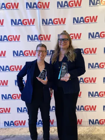 Joey of the Metropolitan Transportation Commission and Carrie of Peak Digital at the 2026 NAGW awards ceremony.